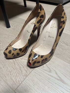 Christian Louboutin Leopard Print Peep-Toe Heels with Red Sole